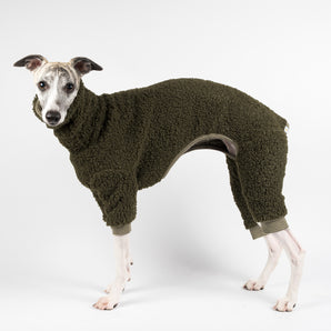 Whippet wearing a fluffy reversible onesie in khaki left side