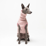 Whippet dog wearing Snootly fleece sleeveless fluffy reversible sweater in marshmallow pink