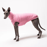 Whippet dog wearing Snootly fleece sleeveless fluffy reversible sweater in marshmallow pink